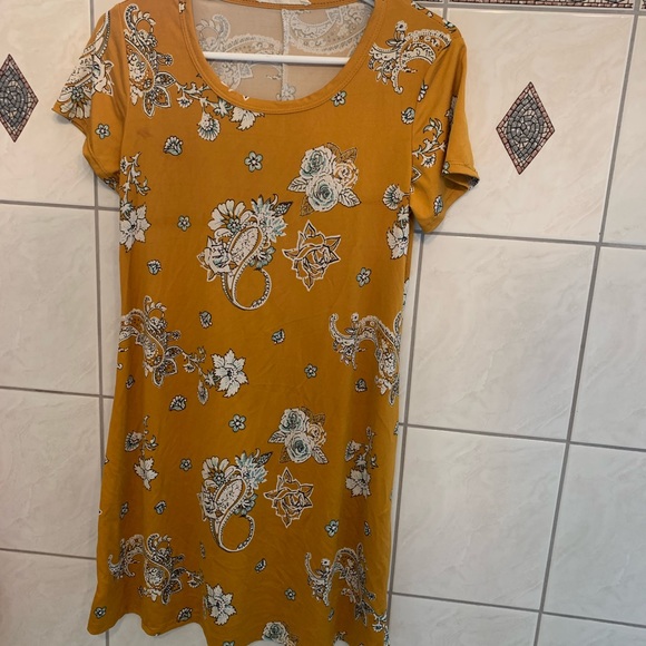 Mustard yellow knee length dress with floral pattern. Never worn. - Picture 1 of 1